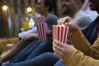 young-friends-having-fun-cinema-open-air &copy; Magnific