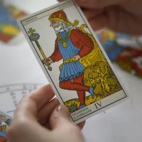 high-angle-woman-reading-tarot &copy; freepik