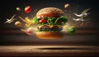 burger-explosif-legumes-fromage-fondu-fond-noir-generative-ai (1) &copy; freepick
