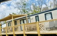 Mobil Home Premium 4 chambres 8 personnes &copy; Family Camping